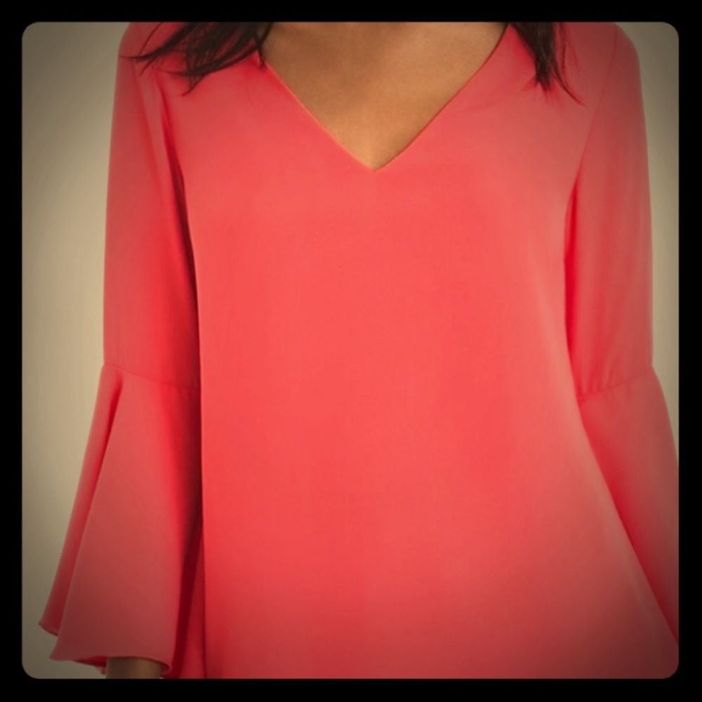 Peachy pink top with bell sleeves